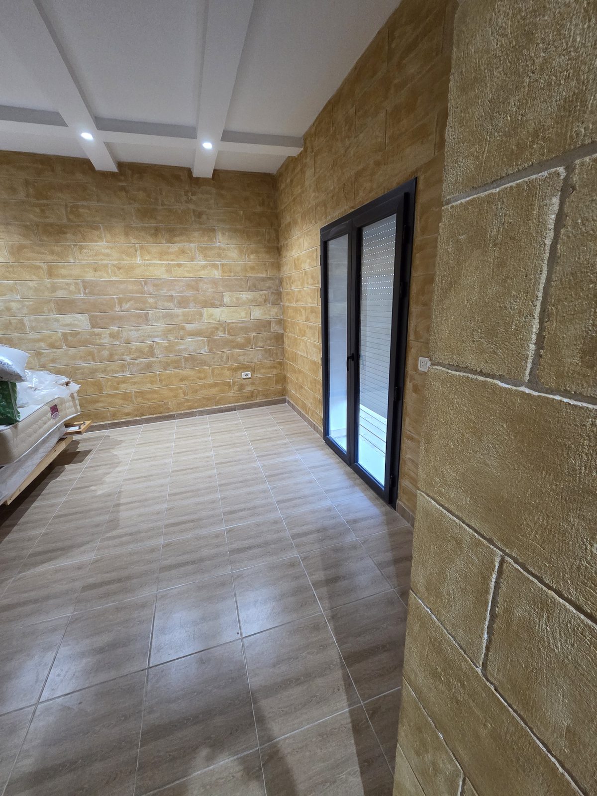 Fig Room — the bedroom with doors onto the balcony